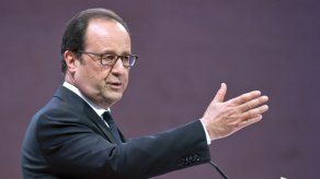 Hollande critica a Sarkozy por minimizar la importancia del cambio climático