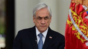 Piñera dará ayuda de un pago único a más de un millón de familias