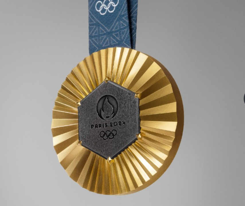 La cara de las medallas de los próximos Juegos Olímpicos tendrá un trozo de hierro de la torre Eiffel y el logo de París 2024, del que emanan rayos grabados en el metal. La cara de las medallas de los próximos Juegos Olímpicos tendrá un trozo de hierro de la torre Eiffel y el logo de París 2024, del que emanan rayos grabados en el metal.