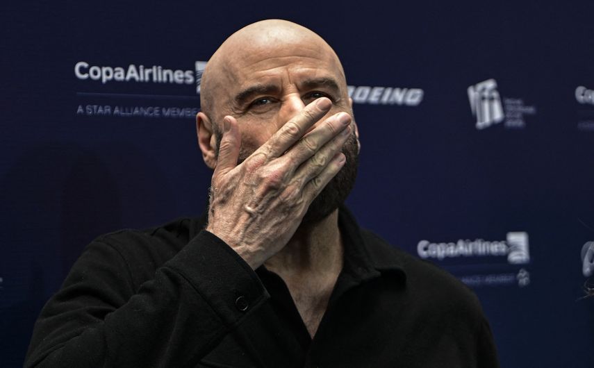 John Travolta fue el invitado a la función de la película John Travolta fue el invitado a la función de la película